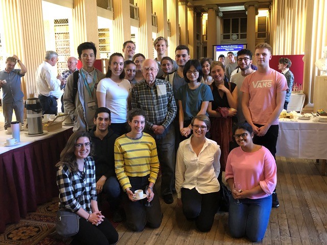 Peter Higgs with undergraduate and MSc students at his 90th birthday celebration